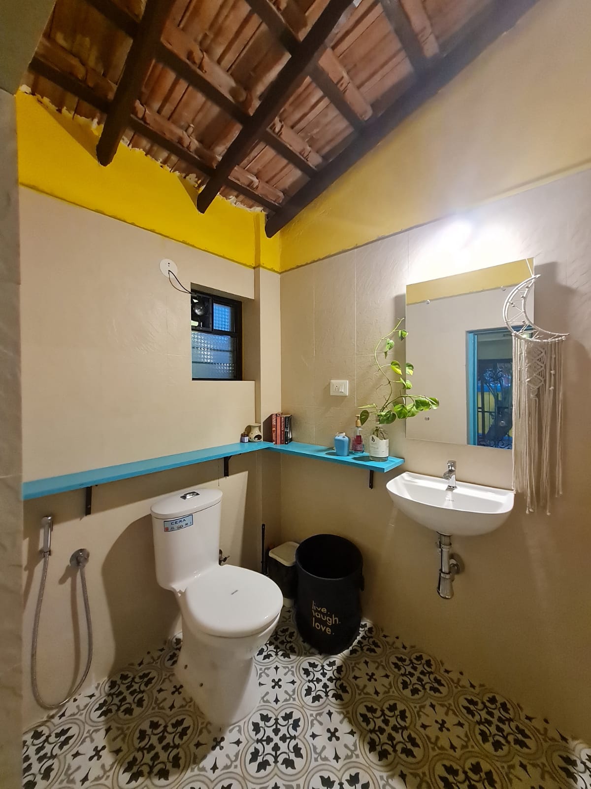 Soppo Room bathroom pot view — clean bathroom, heritage villa touches